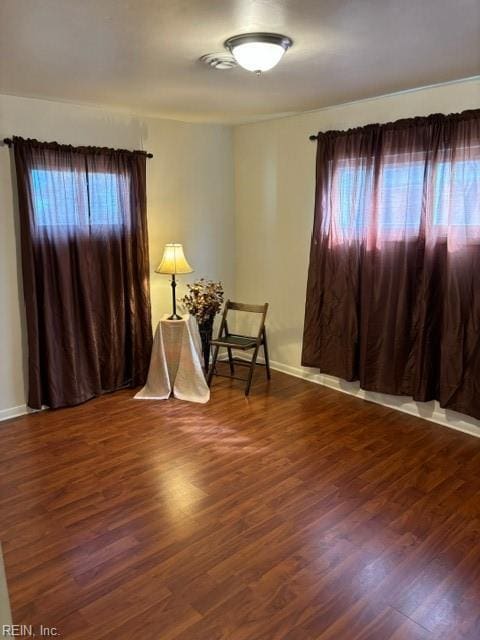 interior space with dark wood-type flooring