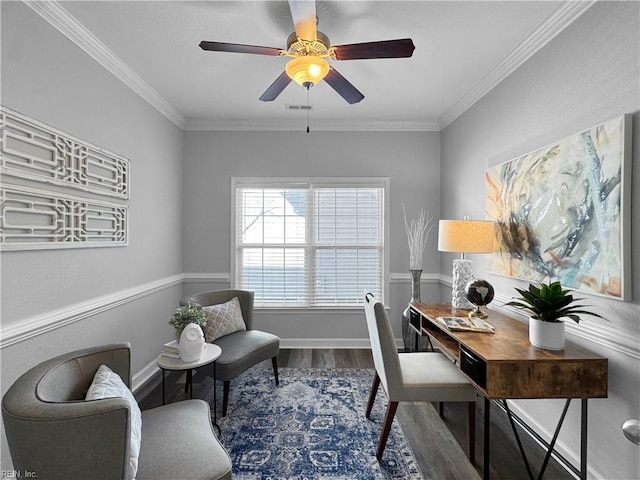 office area with ceiling fan, dark wood-type flooring, and crown molding