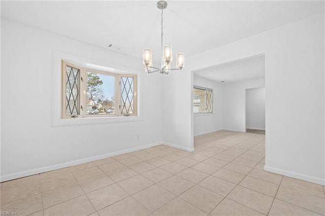 empty room with an inviting chandelier, visible vents, baseboards, and light tile patterned floors