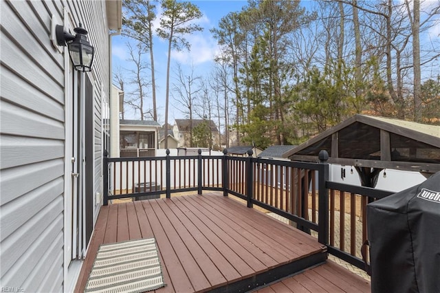 wooden terrace with grilling area