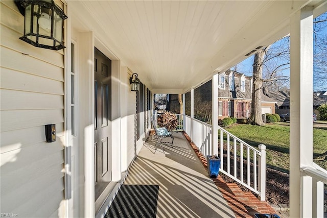 balcony featuring covered porch