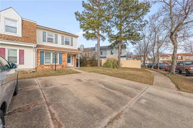 view of front facade featuring a front yard