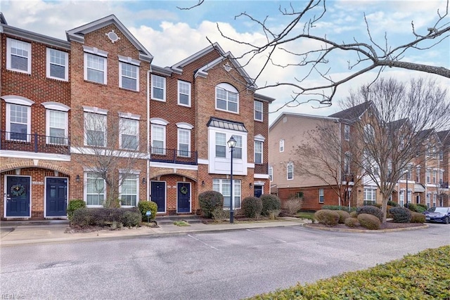 multi unit property featuring brick siding