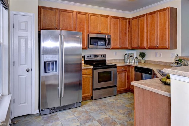 kitchen with light countertops, appliances with stainless steel finishes, brown cabinetry, ornamental molding, and a sink