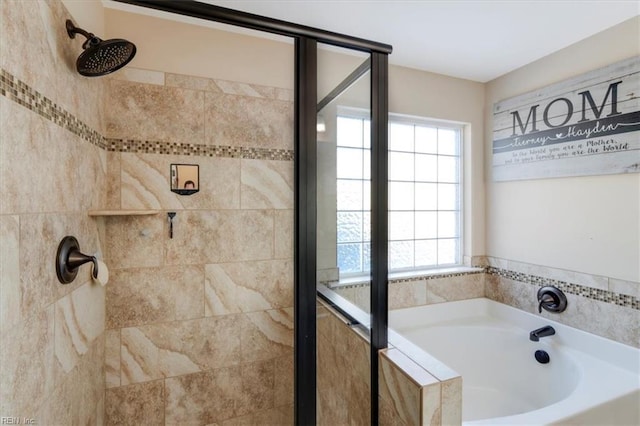 full bath featuring a shower stall and a bath