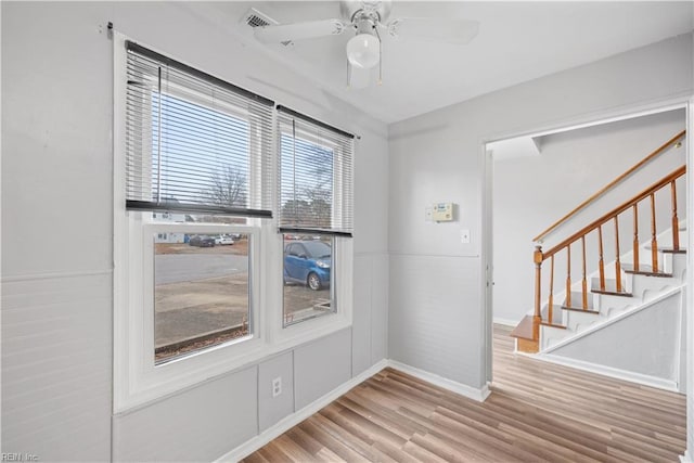 entrance foyer featuring light hardwood / wood-style floors and ceiling fan