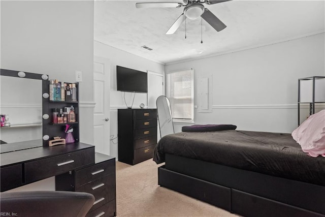 bedroom featuring ceiling fan and light colored carpet