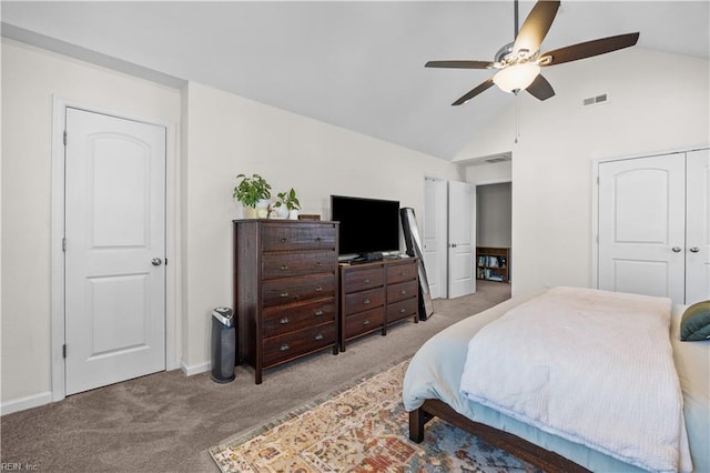 bedroom featuring light colored carpet, visible vents, vaulted ceiling, ceiling fan, and baseboards