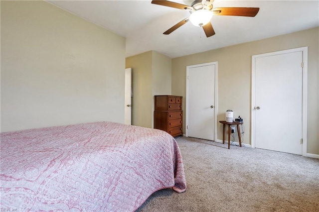 bedroom featuring carpet flooring, ceiling fan, and baseboards