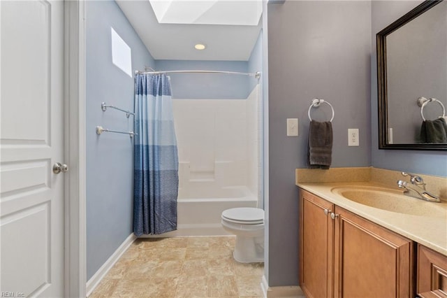 bathroom with toilet, shower / tub combo, a skylight, vanity, and baseboards