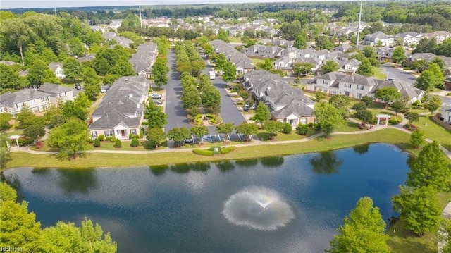 bird's eye view with a water view and a residential view