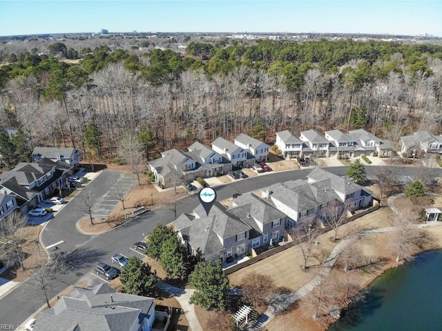 bird's eye view with a residential view and a water view