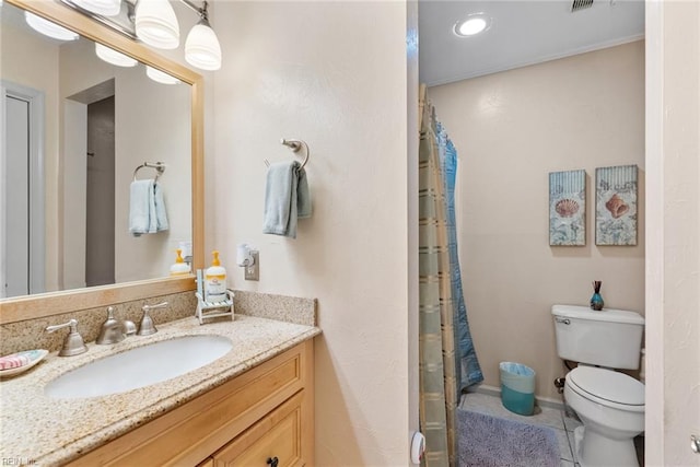 full bathroom with vanity, a shower with shower curtain, tile patterned flooring, and toilet