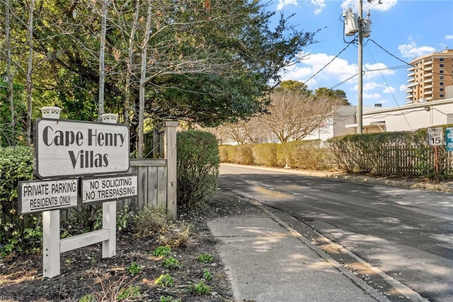 view of road with curbs and sidewalks