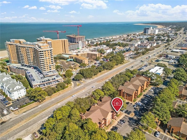 aerial view featuring a water view and a view of city