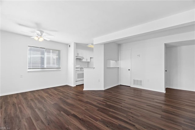 unfurnished living room featuring baseboards, dark wood-style flooring, visible vents, and a ceiling fan