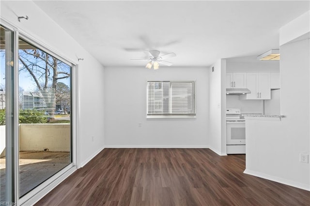 unfurnished living room with a ceiling fan, baseboards, and dark wood-style flooring