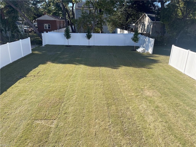 view of yard with fence