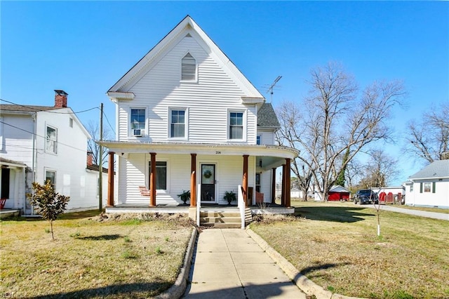 view of front of house featuring a porch, a front yard, and cooling unit