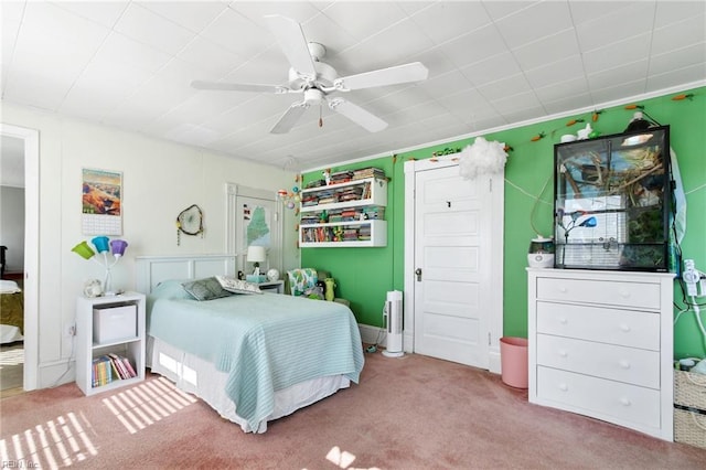 bedroom with ceiling fan and light colored carpet