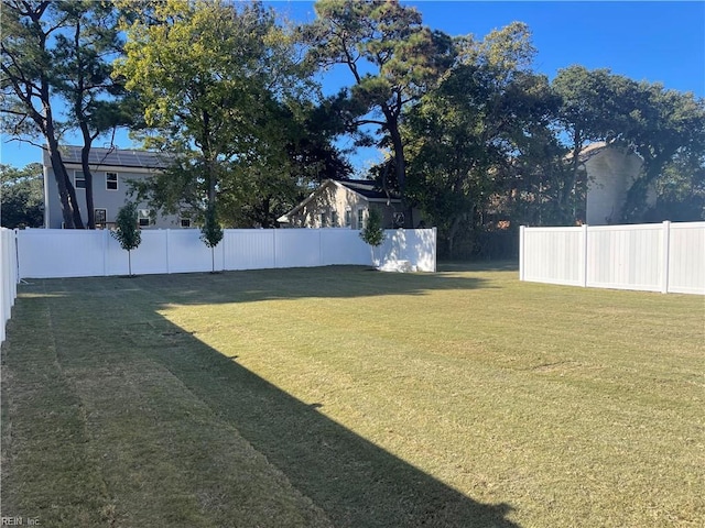 view of yard with fence