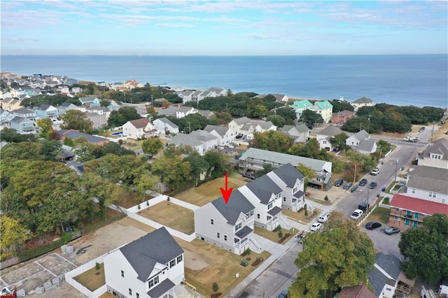 aerial view featuring a water view and a residential view