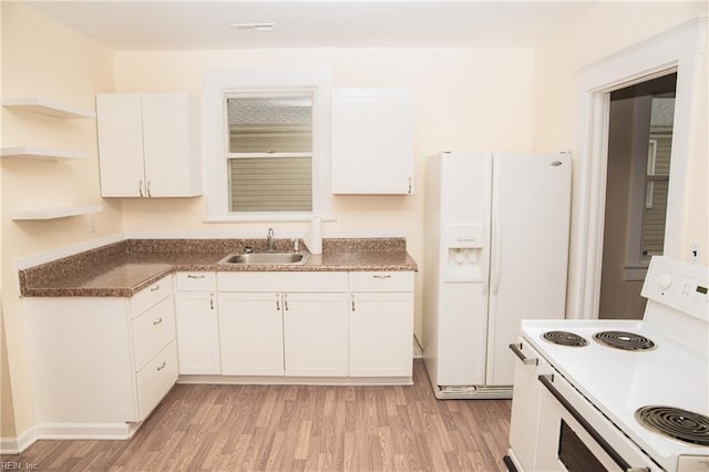kitchen with open shelves, light wood-style floors, white cabinetry, a sink, and white appliances