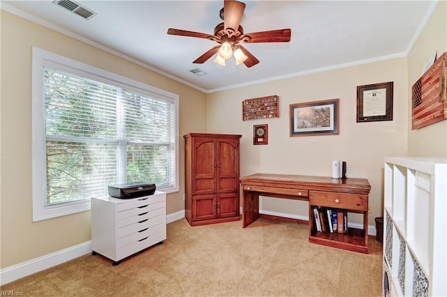 office area featuring ornamental molding, visible vents, light carpet, and baseboards