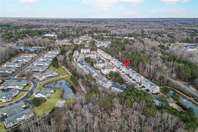 bird's eye view with a water view and a residential view