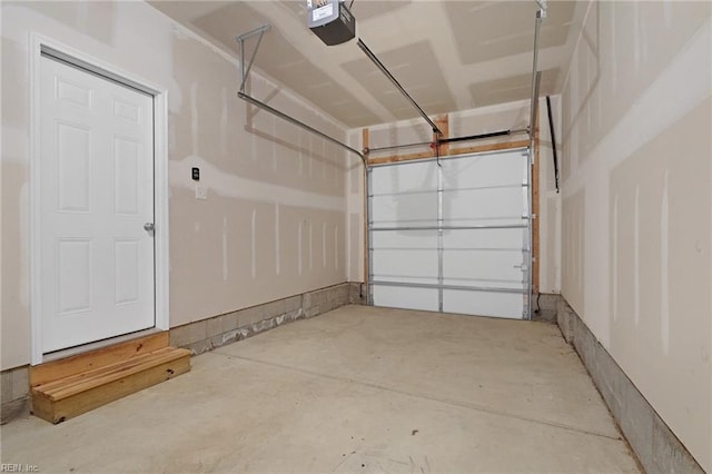 garage featuring a garage door opener