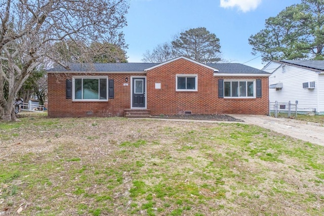 single story home featuring entry steps, brick siding, and crawl space