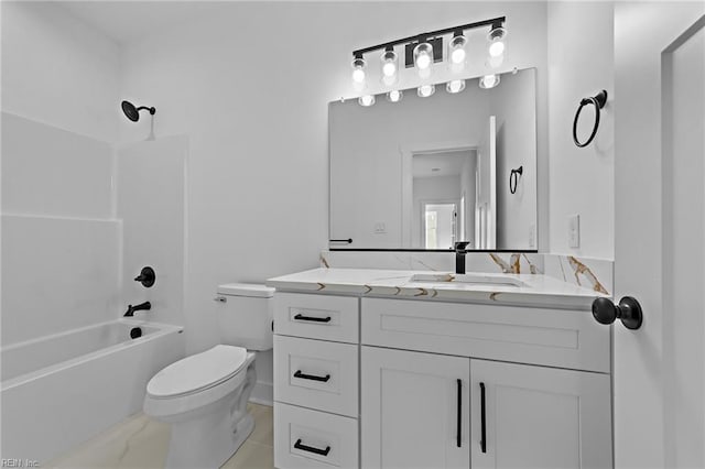 bathroom with toilet, shower / tub combination, and vanity