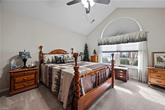 bedroom featuring light colored carpet, visible vents, ceiling fan, high vaulted ceiling, and baseboards