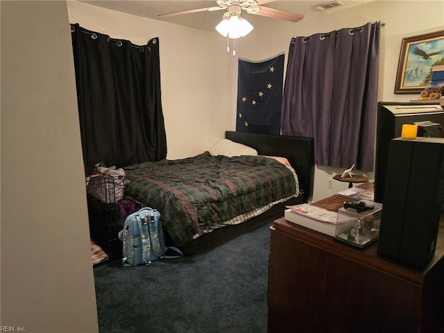 bedroom with carpet, visible vents, and ceiling fan