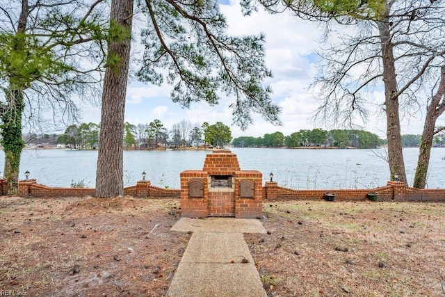 exterior space with a water view