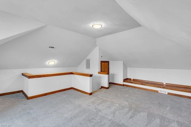 additional living space with visible vents and baseboards