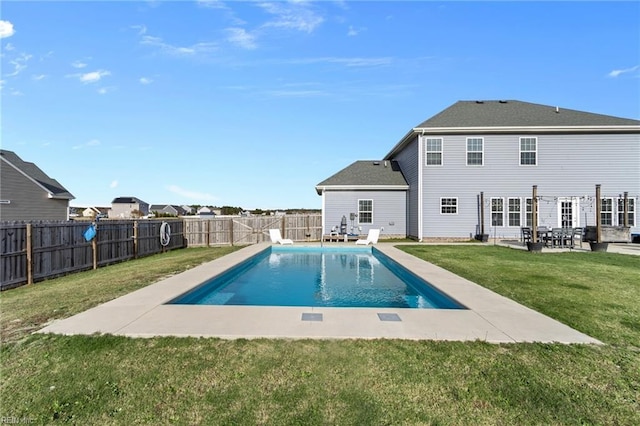 view of swimming pool featuring a lawn, a patio area, a fenced backyard, and a fenced in pool