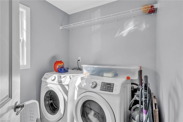 laundry room featuring laundry area and washer and dryer