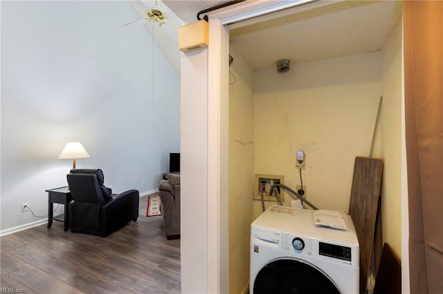 washroom with dark wood finished floors, washer / clothes dryer, a ceiling fan, laundry area, and baseboards