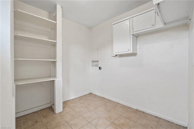 laundry area with laundry area, hookup for a washing machine, and baseboards