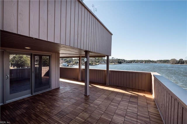 view of patio with a water view