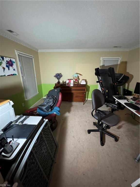 office area with visible vents, crown molding, and a textured ceiling