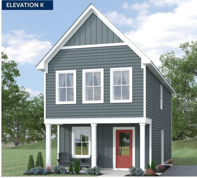 view of front of property featuring board and batten siding and a front yard