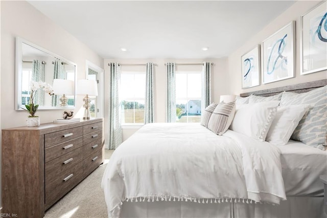 bedroom featuring recessed lighting and light colored carpet