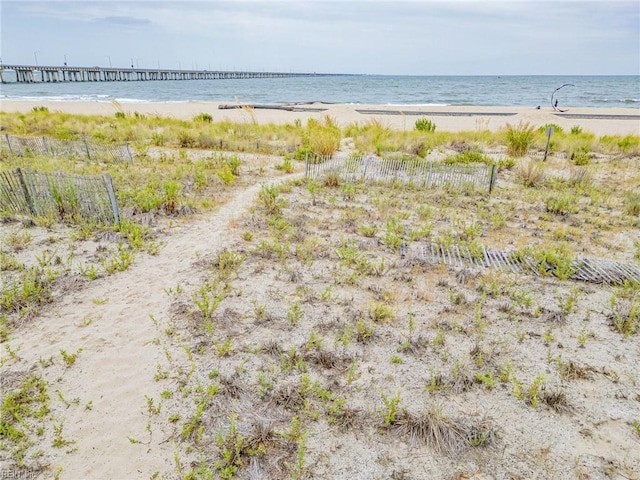 property view of water featuring a view of the beach