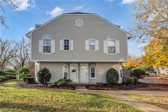 colonial house with a front lawn