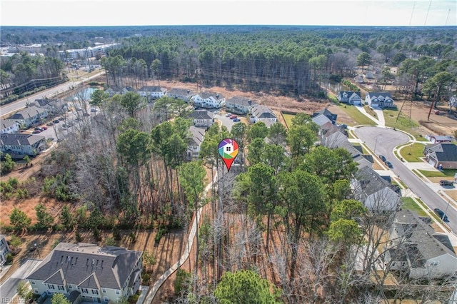 birds eye view of property with a residential view