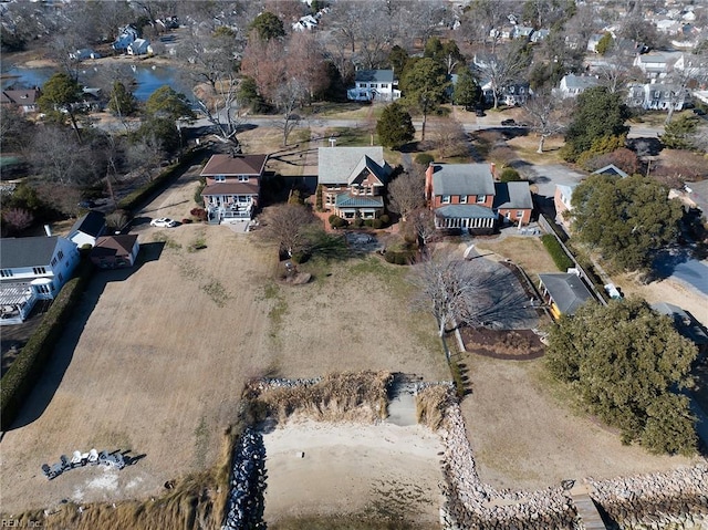 birds eye view of property with a residential view