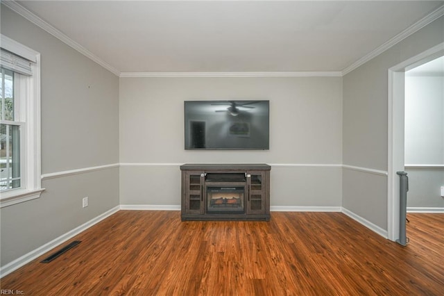 unfurnished living room featuring dark wood-style floors, visible vents, and baseboards