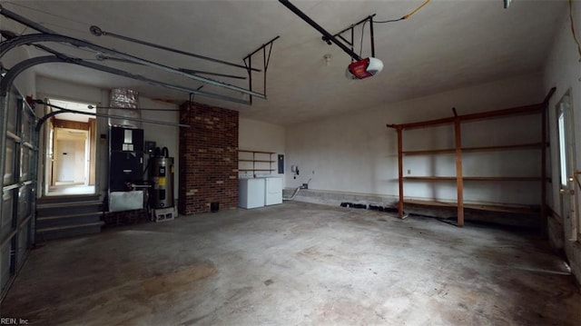 garage with heating unit, a garage door opener, and electric water heater